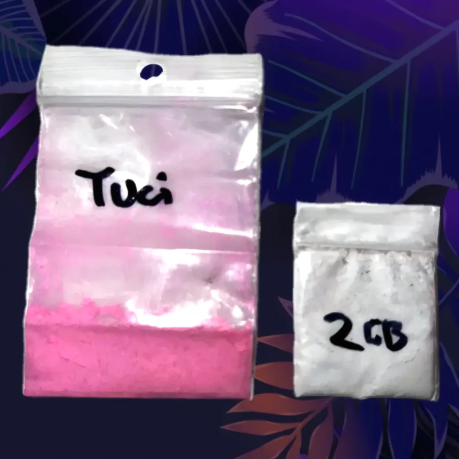 Sachets de poudre rose de tusi et de poudre blanche de 2C-B